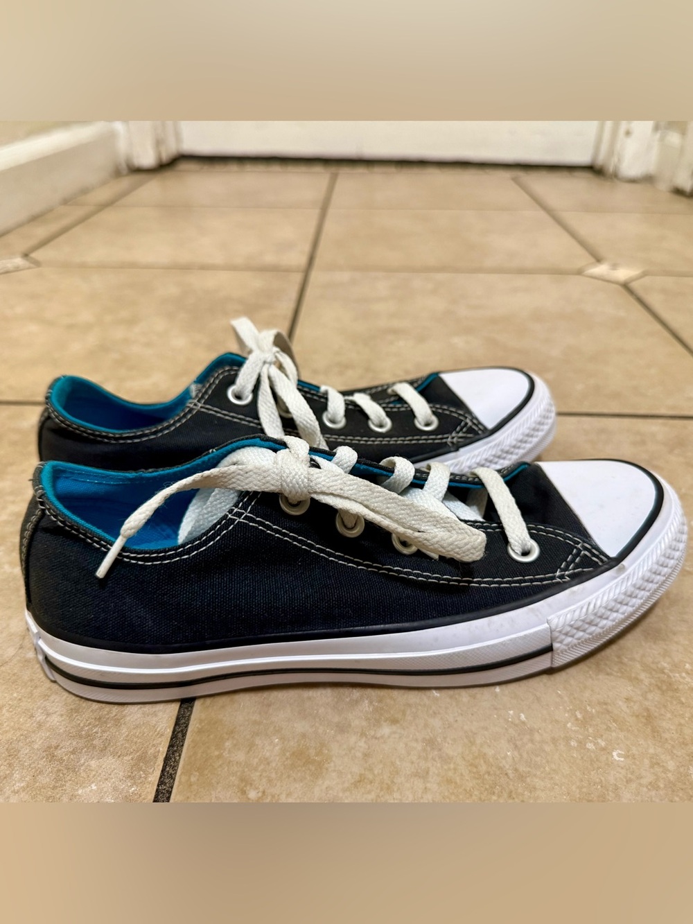 Converse Black Low-Top Canvas Sneakers with White Laces and Blue Lining